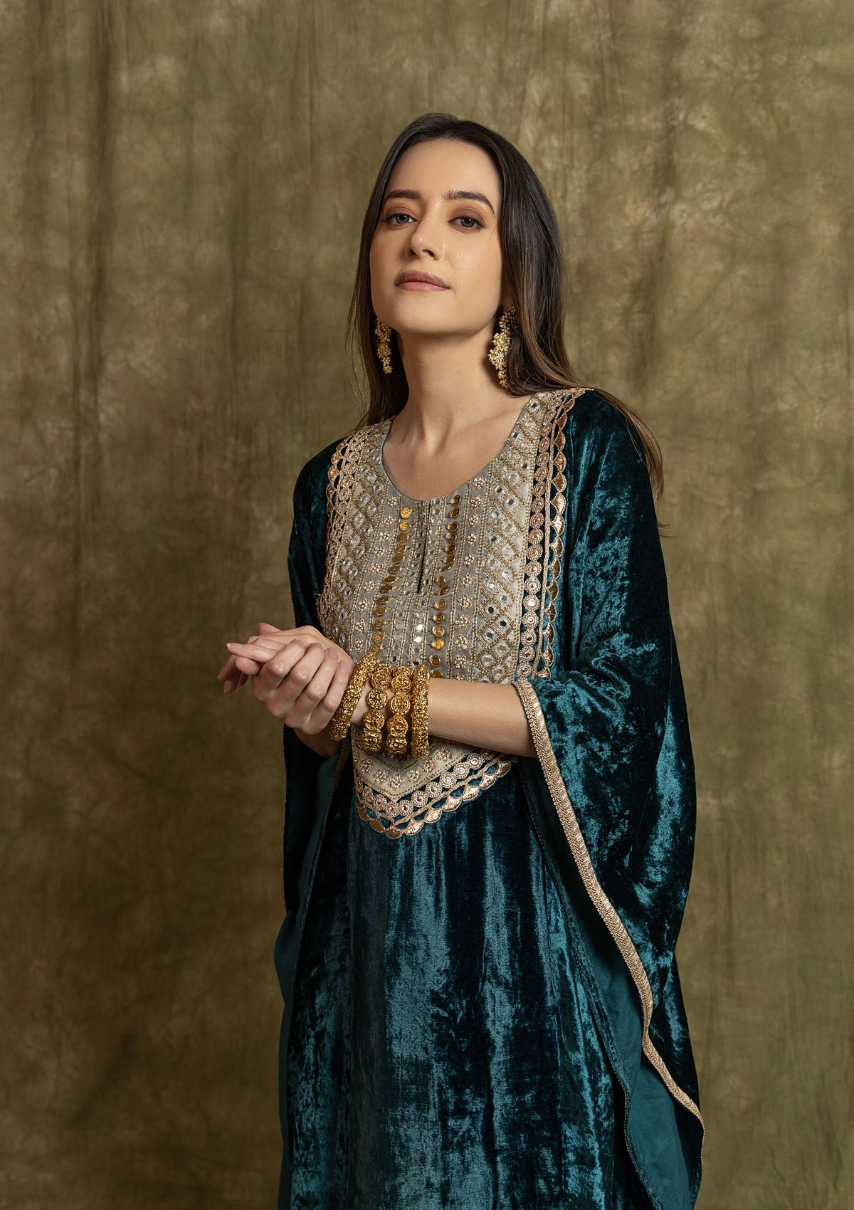 Zeenat Aman in Teal Velvet Kaftan Set