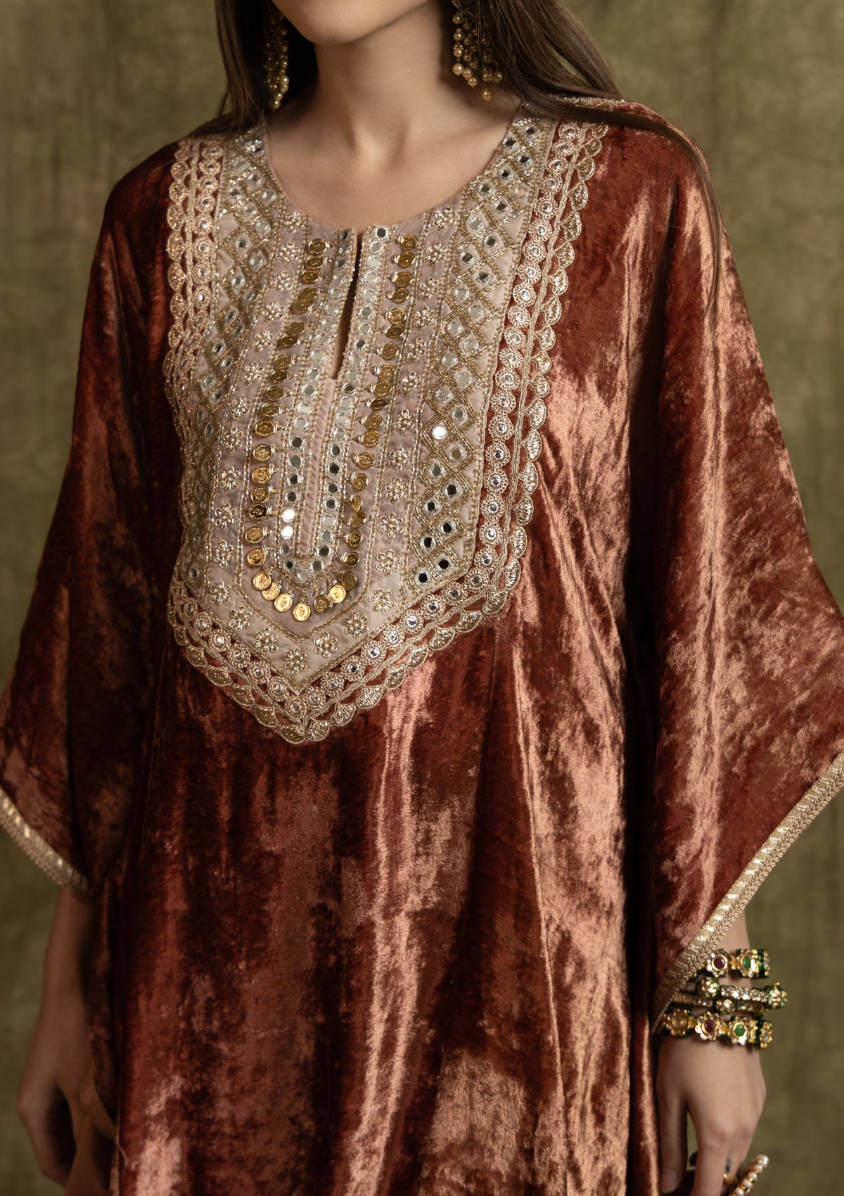 Zeenat Aman in Rust Velvet Kaftan Set