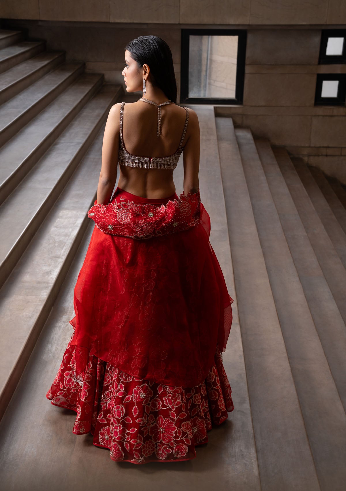 Simran Sethi in Crimson Jaal Cape and Lehenga Set