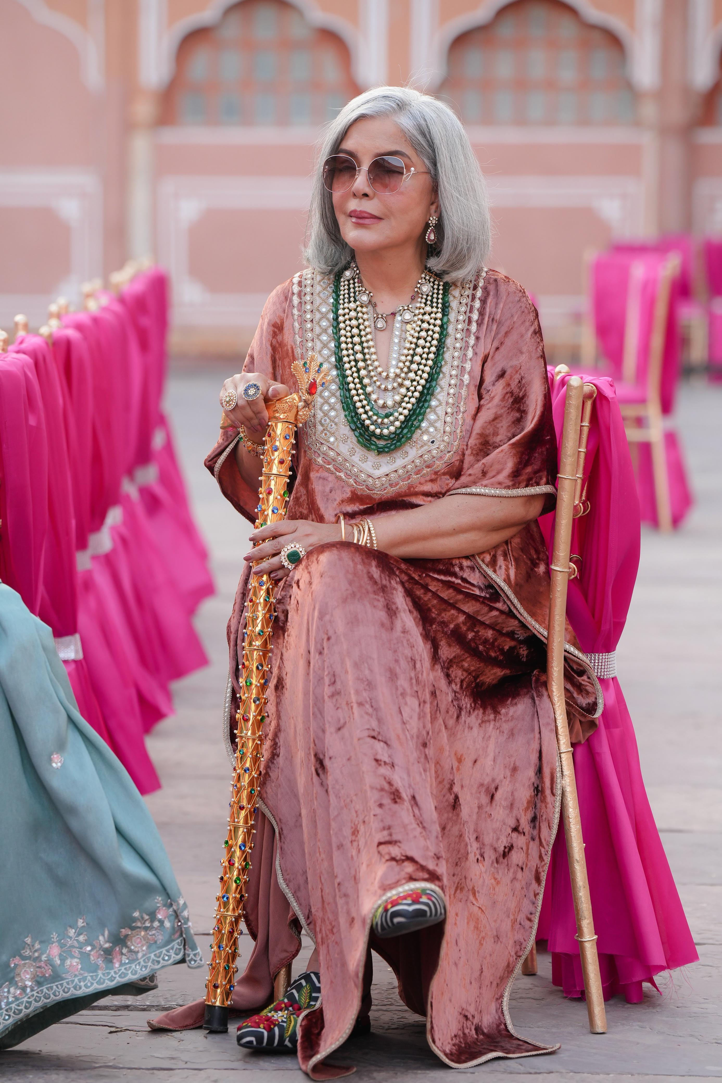 Zeenat Aman in Rust Velvet Kaftan Set