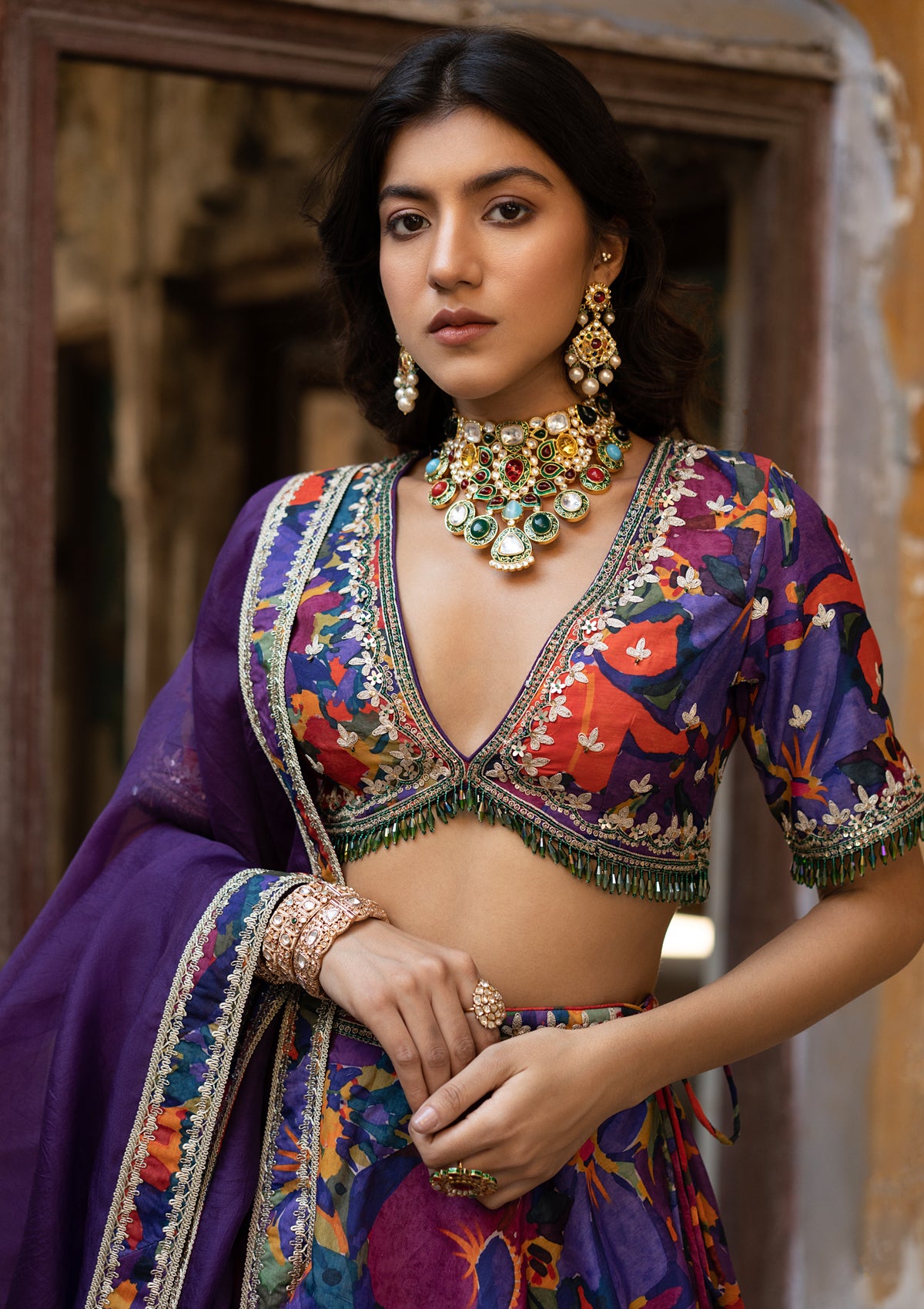 One shoulder hot pink embroidered blouse and ivory lehenga set (E-27/T –  Anju Modi
